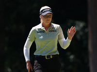 Brooke Henderson of Canada acknowledges the crowd after her birdie on the first green during Day One of the KPMG Women's PGA Championship at...