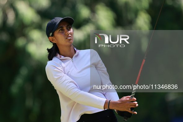 Aditi Ashok of India tees off on the 9th hole during Day One of the KPMG Women's PGA Championship at Sahalee Country Club in Sammamish, Wash...