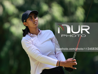 Aditi Ashok of India tees off on the 9th hole during Day One of the KPMG Women's PGA Championship at Sahalee Country Club in Sammamish, Wash...