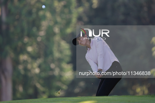 Aditi Ashok of India follows her shot toward the 8th green during Day One of the KPMG Women's PGA Championship at Sahalee Country Club in Sa...