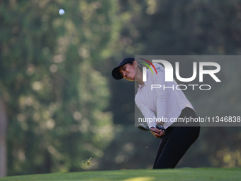 Aditi Ashok of India follows her shot toward the 8th green during Day One of the KPMG Women's PGA Championship at Sahalee Country Club in Sa...