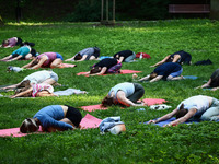 A day ahead of International Yoga Day particpants attend free outdoor yoga classes in Bednarski Park in Krakow, Poland on June 20th. 2024....