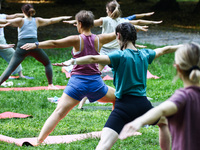 A day ahead of International Yoga Day particpants attend free outdoor yoga classes in Bednarski Park in Krakow, Poland on June 20th. 2024....