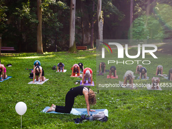 A day ahead of International Yoga Day particpants attend free outdoor yoga classes in Bednarski Park in Krakow, Poland on June 20th. 2024....