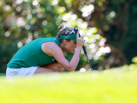 Lexi Thompson of Delray Beach, Florida lines up her putt on the 8th green during the first round of the KPMG Women's PGA Championship at Sah...