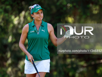 Lexi Thompson of Delray Beach, Florida acknowledges the fans on the 8th green during the first round of the KPMG Women's PGA Championship at...