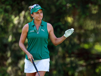 Lexi Thompson of Delray Beach, Florida acknowledges the fans on the 8th green during the first round of the KPMG Women's PGA Championship at...