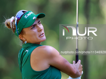 Lexi Thompson of Delray Beach, Florida hits to the 8th green during the first round of the KPMG Women's PGA Championship at Sahalee Country...