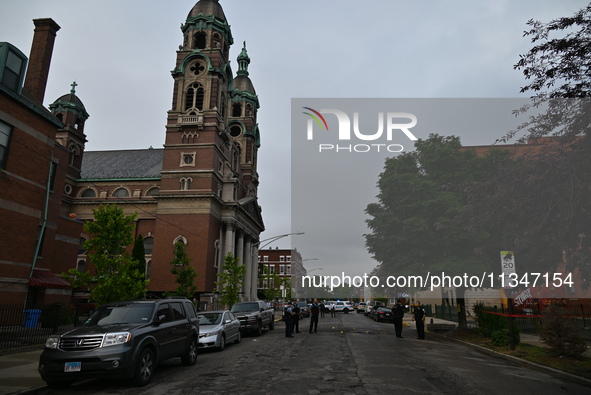 Shell casings are being recovered at the crime scene. A 19-year-old male victim is being shot and killed in Chicago, Illinois, United States...