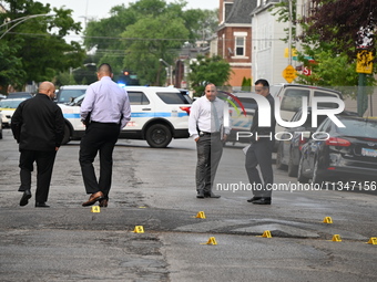 Shell casings are being recovered at the crime scene. A 19-year-old male victim is being shot and killed in Chicago, Illinois, United States...