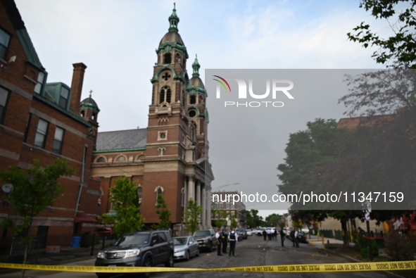 Shell casings are being recovered at the crime scene. A 19-year-old male victim is being shot and killed in Chicago, Illinois, United States...