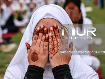 A girl is taking part in the 10th International Yoga Day Celebrations in Baramulla, Jammu and Kashmir, India, on June 21, 2024. Indian Prime...