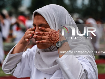 A girl is taking part in the 10th International Yoga Day Celebrations in Baramulla, Jammu and Kashmir, India, on June 21, 2024. Indian Prime...