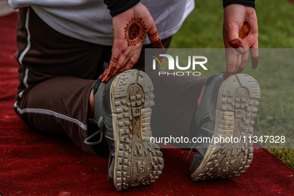 People are taking part in the 10th International Yoga Day Celebrations in Baramulla, Jammu and Kashmir, India, on June 21, 2024. Indian Prim...