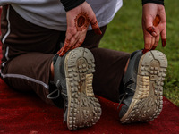 People are taking part in the 10th International Yoga Day Celebrations in Baramulla, Jammu and Kashmir, India, on June 21, 2024. Indian Prim...