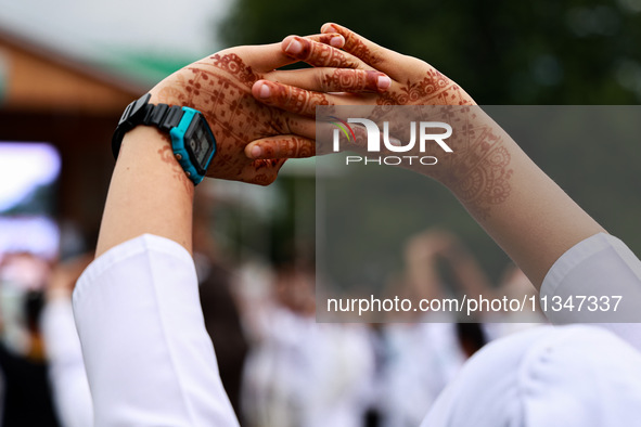 A girl is taking part in the 10th International Yoga Day Celebrations in Baramulla, Jammu and Kashmir, India, on June 21, 2024. Indian Prime...