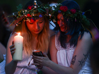 Participants celebrating the summer solstice gathered for the 'Kupala Night' by the Krakus Mound in Krakow, Poland on June 20th, 2024. The K...