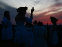 Participants celebrating the summer solstice gathered for the 'Kupala Night' by the Krakus Mound in Krakow, Poland on June 20th, 2024. The K...