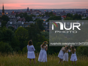 Participants celebrating the summer solstice gathered for the 'Kupala Night' by the Krakus Mound in Krakow, Poland on June 20th, 2024. The K...