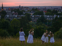 Participants celebrating the summer solstice gathered for the 'Kupala Night' by the Krakus Mound in Krakow, Poland on June 20th, 2024. The K...