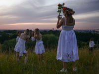 Participants celebrating the summer solstice gathered for the 'Kupala Night' by the Krakus Mound in Krakow, Poland on June 20th, 2024. The K...