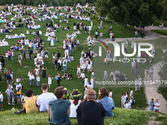 Participants celebrating the summer solstice gathered for the 'Kupala Night' by the Krakus Mound in Krakow, Poland on June 20th, 2024. The K...