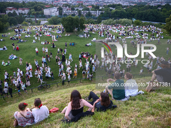 Participants celebrating the summer solstice gathered for the 'Kupala Night' by the Krakus Mound in Krakow, Poland on June 20th, 2024. The K...