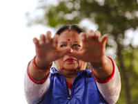 People are performing yoga on the occasion of International Yoga Day. (