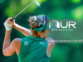 Lexi Thompson of Delray Beach, Florida hits to the 8th green during the first round of the KPMG Women's PGA Championship at Sahalee Country...