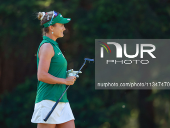 Lexi Thompson of Delray Beach, Florida walks on the 8th green after putting during the first round of the KPMG Women's PGA Championship at S...