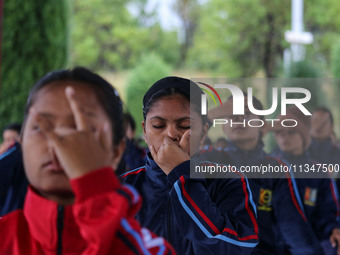 Cadets from the National Cadet Corps (NCC) are performing yoga on International Day of Yoga at Jammu Kashmir Light Infantry Regimental Cente...