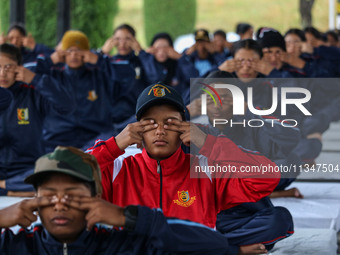 Cadets from the National Cadet Corps (NCC) are performing yoga on International Day of Yoga at Jammu Kashmir Light Infantry Regimental Cente...