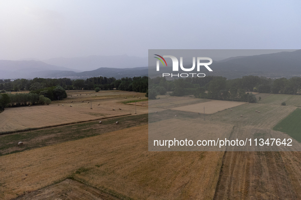 A hazy landscape is seen in an aerial drone view in L’Aquila, Italy, on June 20th, 2024. High atmospheric pressure from Africa (african anti...