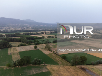 A hazy landscape is seen in an aerial drone view in L’Aquila, Italy, on June 20th, 2024. High atmospheric pressure from Africa (african anti...