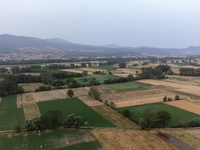 A hazy landscape is seen in an aerial drone view in L’Aquila, Italy, on June 20th, 2024. High atmospheric pressure from Africa (african anti...