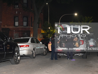 Evidence is being collected at the crime scene. A 50-year-old male victim is being shot multiple times and killed in Chicago, Illinois, Unit...