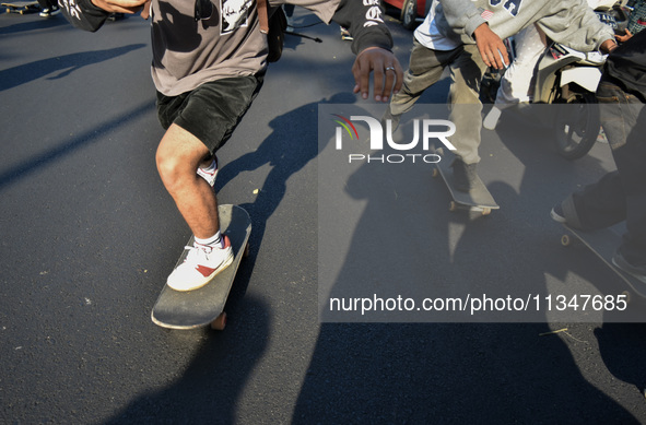 Skaters are taking part in the international world skateboarding day 'Go Skateboarding Day' with a ride around city streets in Malang City,...