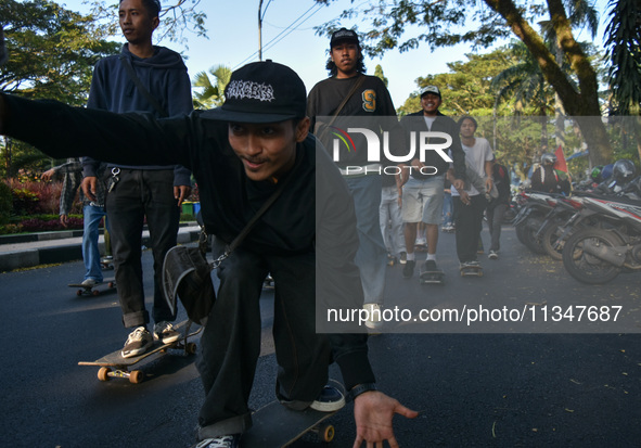 Skaters are taking part in the international world skateboarding day 'Go Skateboarding Day' with a ride around city streets in Malang City,...