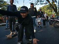 Skaters are taking part in the international world skateboarding day 'Go Skateboarding Day' with a ride around city streets in Malang City,...