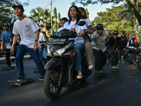 Skaters are taking part in the international world skateboarding day 'Go Skateboarding Day' with a ride around city streets in Malang City,...