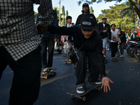 Skaters are taking part in the international world skateboarding day 'Go Skateboarding Day' with a ride around city streets in Malang City,...