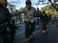 Skaters are taking part in the international world skateboarding day 'Go Skateboarding Day' with a ride around city streets in Malang City,...