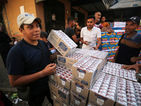 A Palestinian is displaying his wares in a market in Deir al-Balah in the central Gaza Strip, on June 21, 2024, as the conflict is continuin...