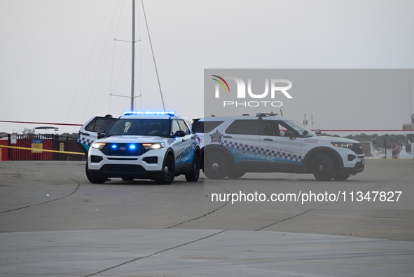 Chicago police are investigating the crime scene, which is leaving two people dead at 31st Street Harbor in Chicago, Illinois, on June 21, 2...