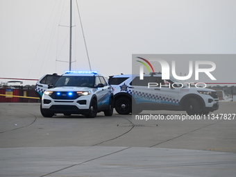 Chicago police are investigating the crime scene, which is leaving two people dead at 31st Street Harbor in Chicago, Illinois, on June 21, 2...