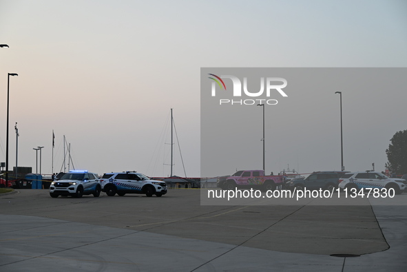 Chicago police are investigating the crime scene, which is leaving two people dead at 31st Street Harbor in Chicago, Illinois, on June 21, 2...