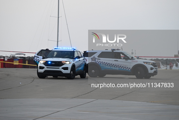 Chicago police are investigating the crime scene, which is leaving two people dead at 31st Street Harbor in Chicago, Illinois, on June 21, 2...