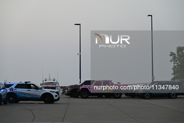 Chicago police are investigating the crime scene, which is leaving two people dead at 31st Street Harbor in Chicago, Illinois, on June 21, 2...