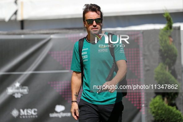 Fernando Alonso, from Aston Martin Aramco Formula One Team, is arriving at the Barcelona Catalunya circuit, in Barcelona, Spain, on June 21,...