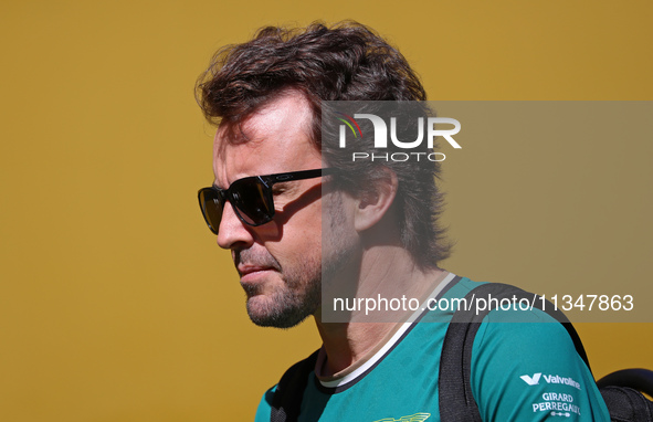 Fernando Alonso, from Aston Martin Aramco Formula One Team, is arriving at the Barcelona Catalunya circuit, in Barcelona, Spain, on June 21,...